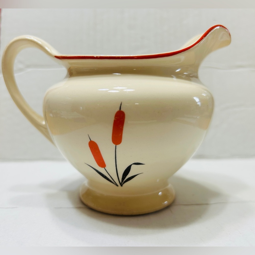 Sears & Roebuck Cattail pattern creamer. Vintage, good used condition.